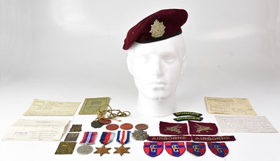 Lot 430 - A collection of WWII militaria items,...