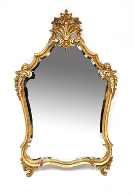 Lot 84 - A 20th century Rococo-style gilded wall mirror