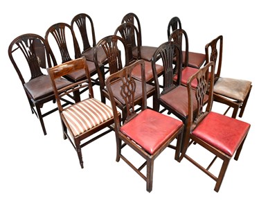 Lot 1048 - A set of eight Hepplewhite style mahogany...