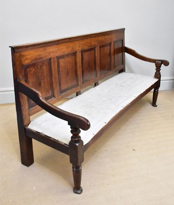 Lot 1153 - A 19th century oak settle, with five panel...
