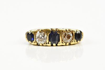 Lot 59 - An 18ct yellow gold five stone sapphire and...