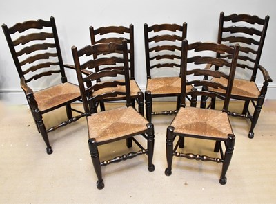Lot 1029 - A set of six oak rush seated ladder back...