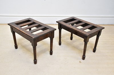 Lot 1123 - A pair of early 20th century oak luggage racks,...