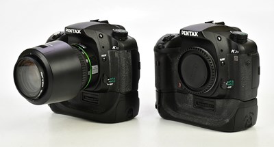 Lot 1174 - PENTAX; two Pentax DSLR cameras, comprising a...