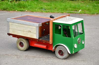 Lot 1632 - A modern battery operated child's lorry, with...