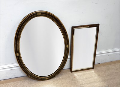 Lot 1139 - An Edwardian oval wall mirror with bevelled...