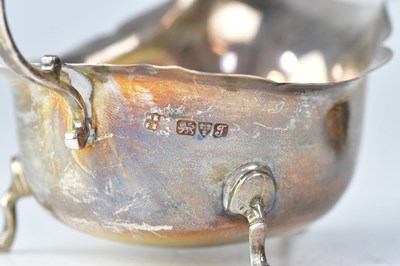 Lot 938 - A pair of George V sauce boats with flying...