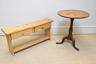 Lot 1161 - A pine two drawer floor shelf, height 47cm,...