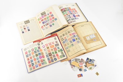 Lot 645 - WORLD STAMPS; in four junior type albums,...