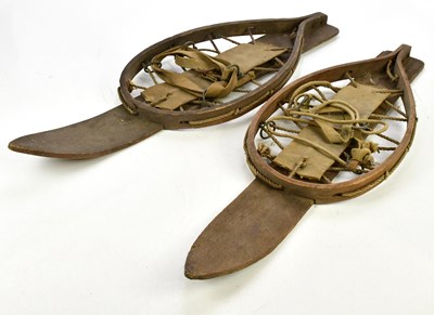 Lot 1473 - A pair of early 20th century ski snowshoes,...