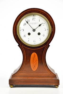 Lot 1343 - An Edwardian inlaid mahogany balloon mantel...