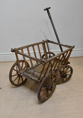 Lot 244 - An old metal bound wooden dog cart, length 91cm.