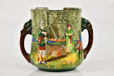 Lot 12 - ROYAL DOULTON; a limited edition loving cup,...