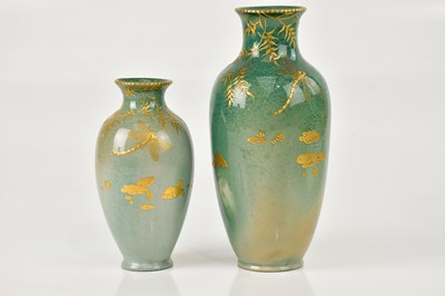 Lot 14 - ROYAL DOULTON; two vases in Titanian green...