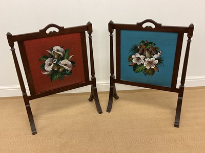 Lot 811 - Two 19th century mahogany framed firescreens...