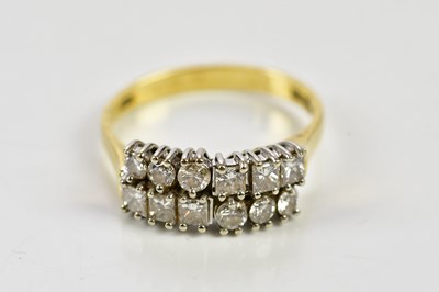 Lot 43 - An 18ct yellow gold diamond dress ring set...