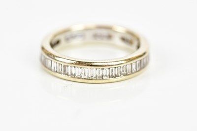 Lot 30 - An 18ct yellow and white gold full eternity...