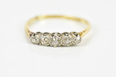 Lot 142 - An 18ct yellow gold five stone graduated...