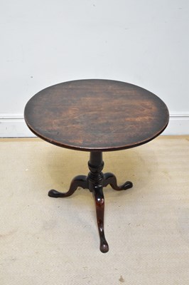 Lot 1064 - A 19th century mahogany tilt-top tripod table,...
