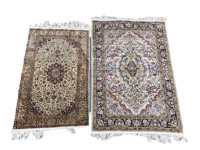 Lot 1256 - A good quality Eastern part silk rug,...