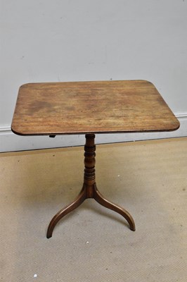 Lot 1101 - A 19th century mahogany tilt-top tripod table...