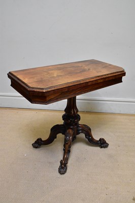 Lot 1021 - A Victorian rosewood fold-over swivel top card...