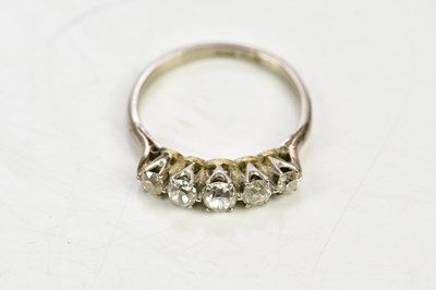 Lot 63 - An 18ct white gold and graduated five stone...