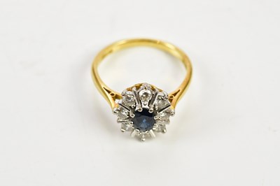 Lot 64 - An 18ct yellow gold sapphire and diamond oval...