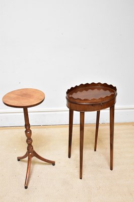 Lot 1041 - A 19th century elm tripod table, height 70cm...