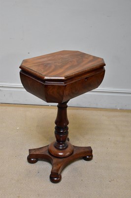 Lot 1039 - A 19th century mahogany teapoy of shaped...
