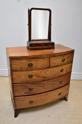 Lot 1040 - A 19th century mahogany bowfront chest of two...
