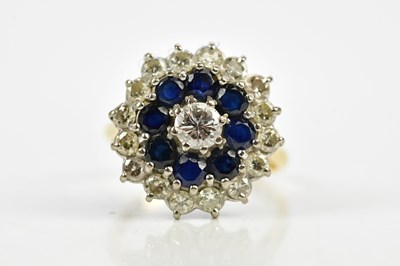 Lot 66 - A yellow metal diamond and sapphire dress ring,...