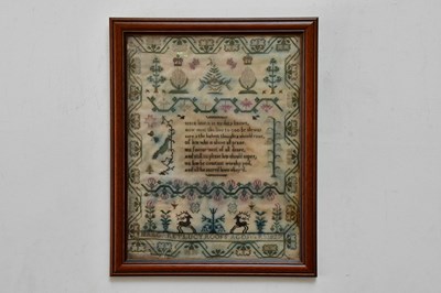 Lot 1548 - A 19th century needlework sampler decorated...