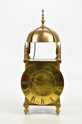 Lot 685 - A brass cased lantern clock with twin fusee...