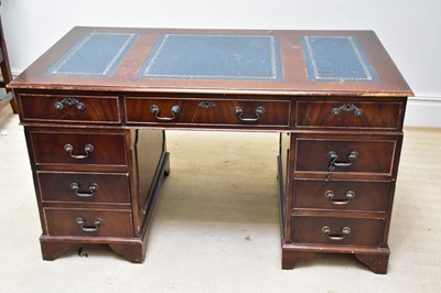 Lot 1180 - A reproduction mahogany twin pedestal...