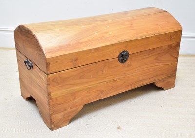 Lot 1182 - A reproduction pine dome topped blanket chest,...