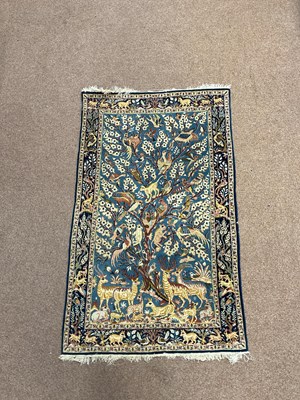 Lot 289 - A blue ground Turkish Tree of Life pattern...