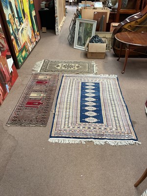 Lot 287 - An Eastern style blue ground rug with...