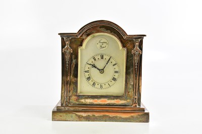 Lot 701 - A silver plated on copper timepiece, the...