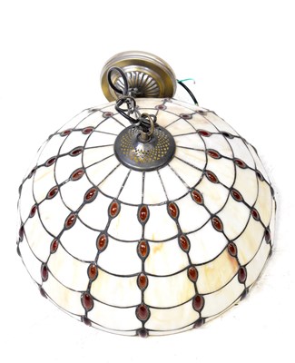 Lot 112 - A Tiffany-style leaded glass lampshade, in...