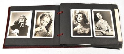 Lot 676 - An album of black and white photographs and promotional photo cards