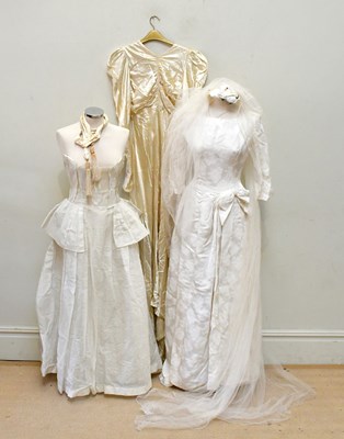 Lot 919 - A vintage 1930s liquid satin cream full length...