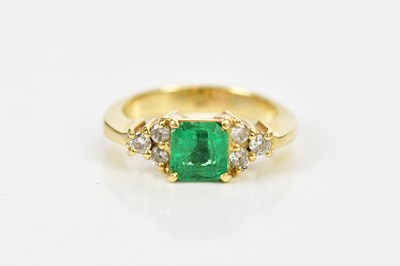 Lot 52 - An 18ct yellow gold Colombian emerald and...