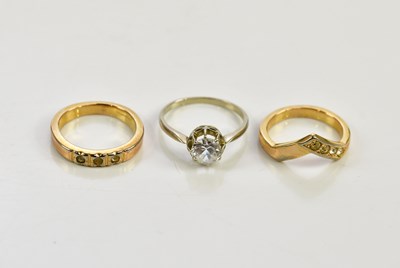 Lot 195 - Three yellow metal dress rings, unmarked,...