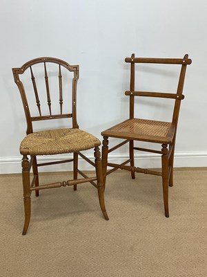 Lot 874 - Two stained beech chairs, one with woven seat...