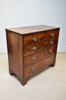 Lot 150 - A George III mahogany chest of two short over...