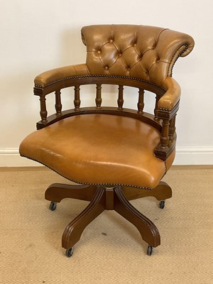 Lot 785 - A button leather upholstered and spindle back...