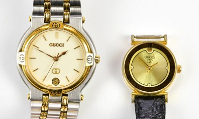Lot 884 - GUCCI; a silver and gold tone 9000L vintage...