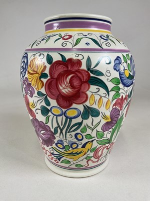 Lot 176 - POOLE; floral pottery vase, height 33cm.