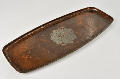 Lot 154 - HUGH WALLIS; an Arts & Crafts planished copper...